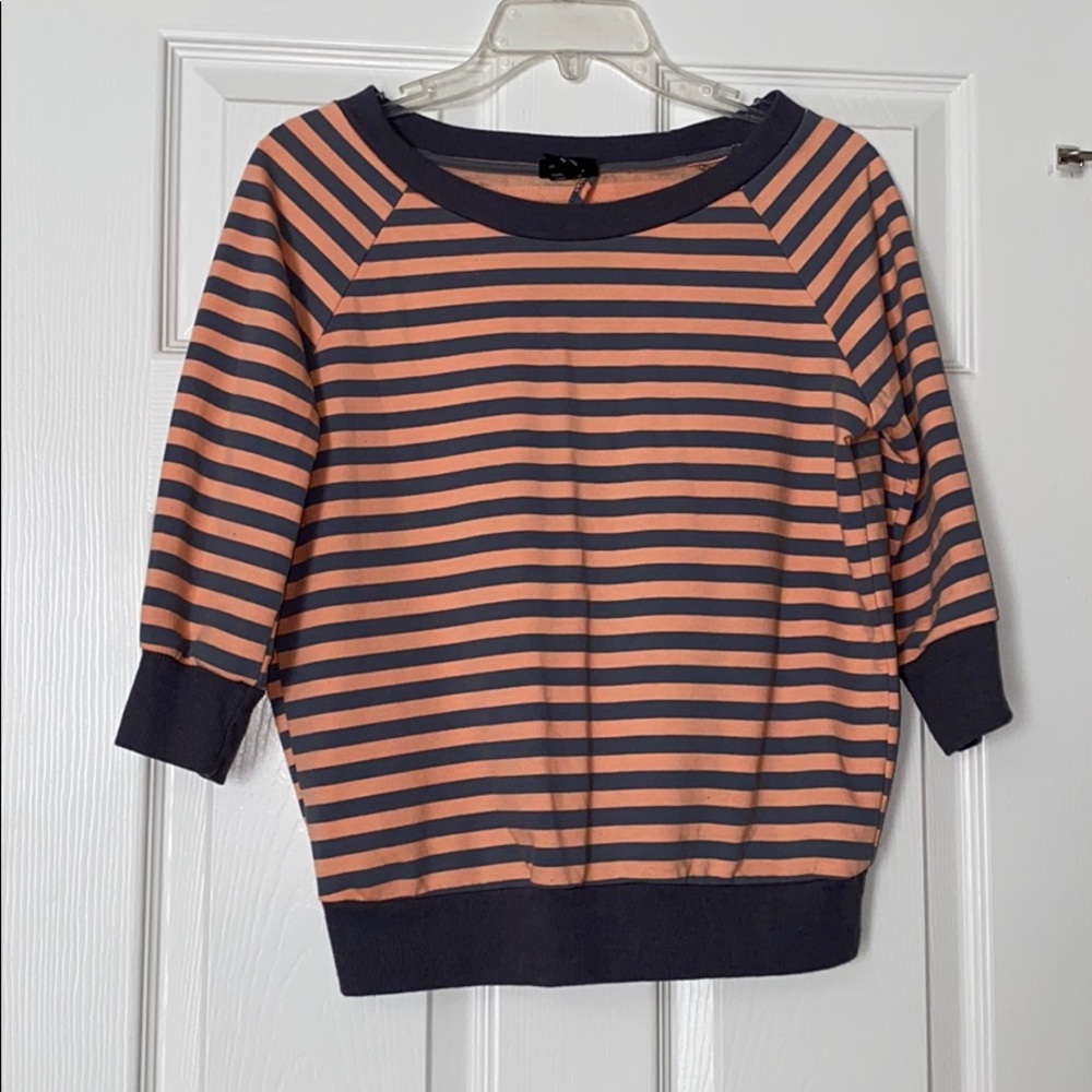 Peach and gray light sweater with open back